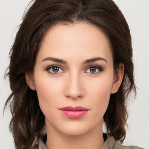 Neutral white young-adult female with medium  brown hair and brown eyes