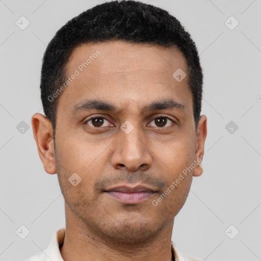 Neutral latino young-adult male with short  brown hair and brown eyes