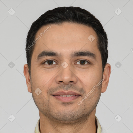 Joyful white young-adult male with short  black hair and brown eyes