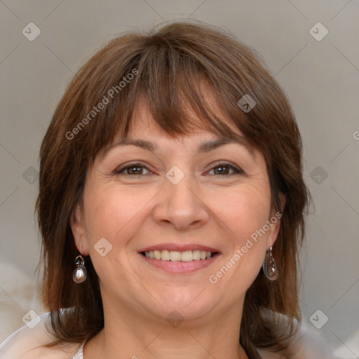 Joyful white adult female with medium  brown hair and brown eyes