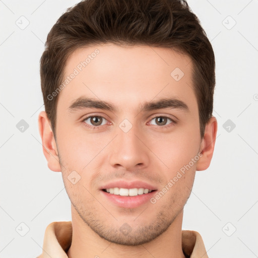 Joyful white young-adult male with short  brown hair and brown eyes