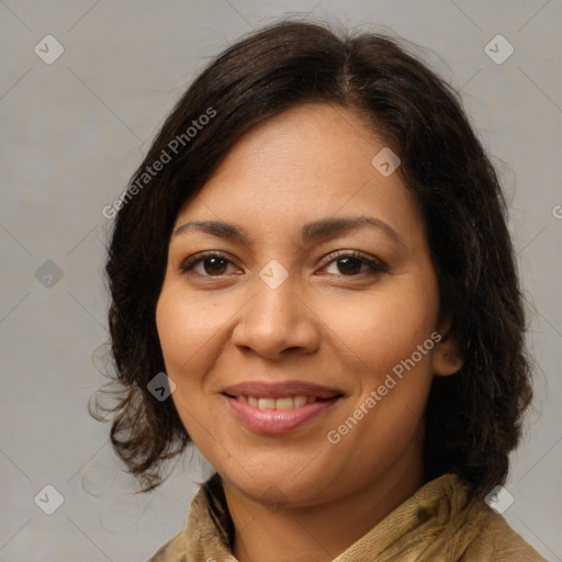 Joyful latino young-adult female with medium  brown hair and brown eyes