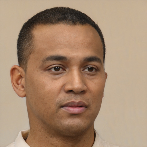 Neutral latino young-adult male with short  brown hair and brown eyes