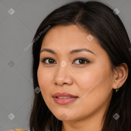 Joyful latino young-adult female with long  brown hair and brown eyes