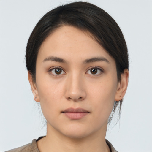 Neutral asian young-adult female with medium  brown hair and brown eyes