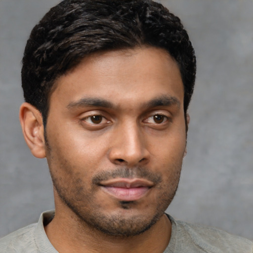 Neutral black young-adult male with short  brown hair and brown eyes