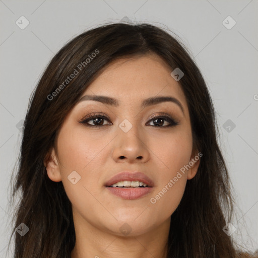 Joyful asian young-adult female with long  brown hair and brown eyes