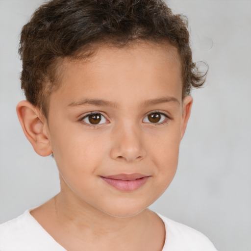 Joyful white child female with short  brown hair and brown eyes