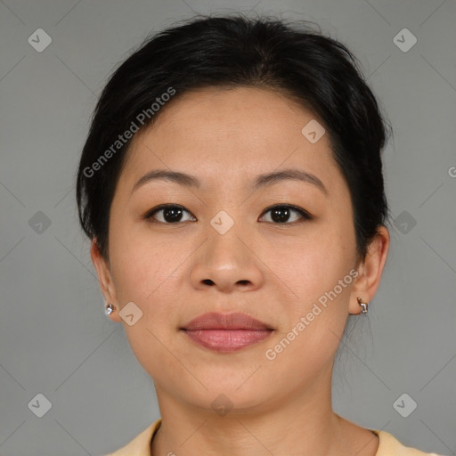 Joyful asian young-adult female with medium  brown hair and brown eyes