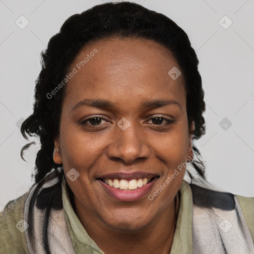 Joyful black adult female with short  brown hair and brown eyes