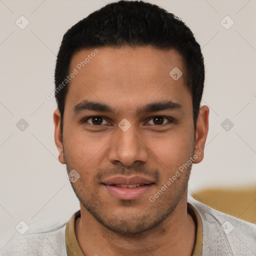 Joyful white young-adult male with short  black hair and brown eyes