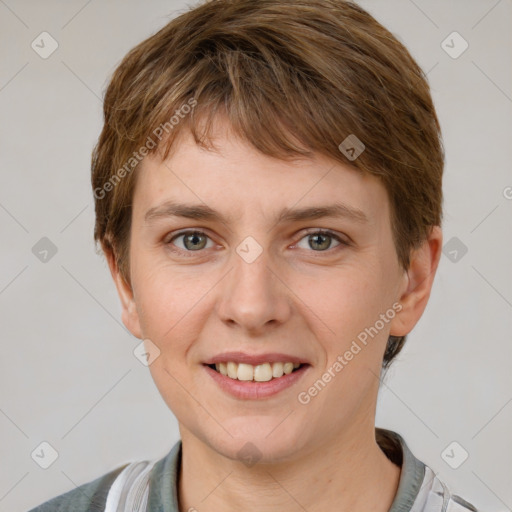 Joyful white young-adult female with short  brown hair and grey eyes