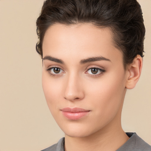 Neutral white young-adult female with short  brown hair and brown eyes