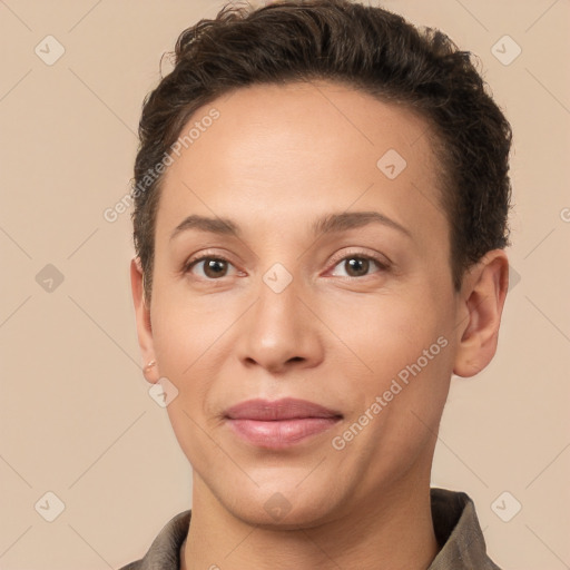 Joyful white young-adult female with short  brown hair and brown eyes