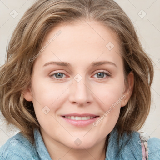 Joyful white young-adult female with medium  brown hair and blue eyes