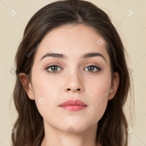 Neutral white young-adult female with long  brown hair and brown eyes