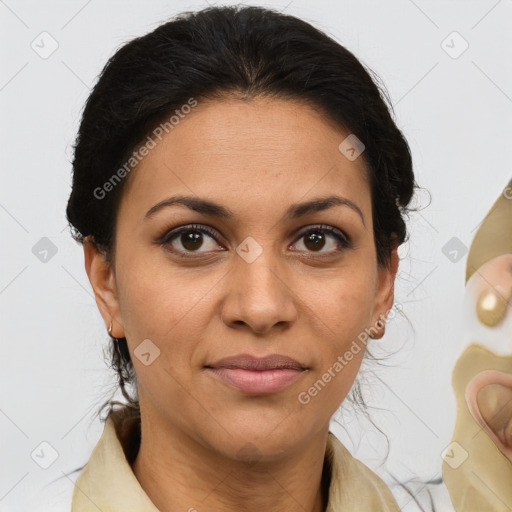 Joyful latino adult female with medium  brown hair and brown eyes