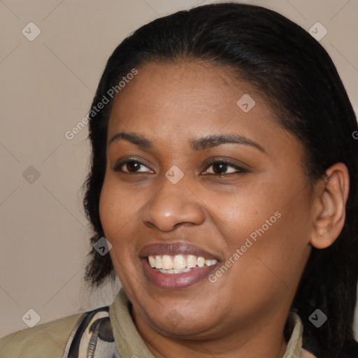 Joyful latino young-adult female with medium  brown hair and brown eyes