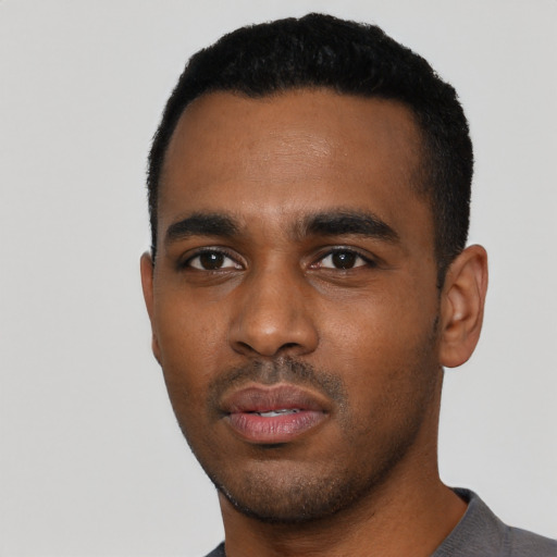 Neutral black young-adult male with short  black hair and brown eyes
