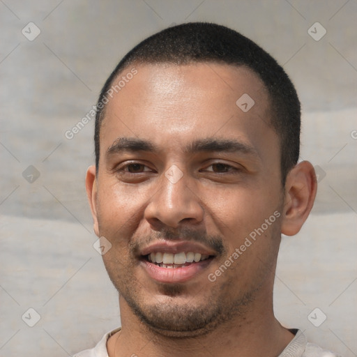 Joyful white young-adult male with short  black hair and brown eyes