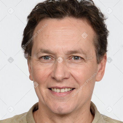 Joyful white adult male with short  brown hair and grey eyes