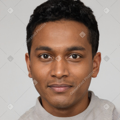 Neutral black young-adult male with short  black hair and brown eyes
