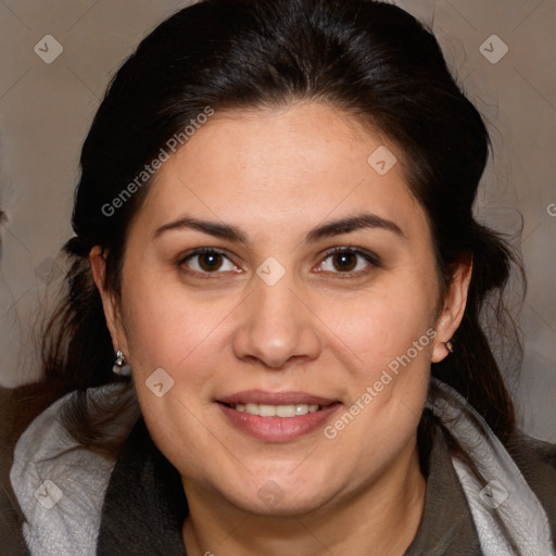 Joyful white adult female with medium  brown hair and brown eyes