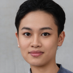 Joyful asian young-adult female with short  black hair and brown eyes