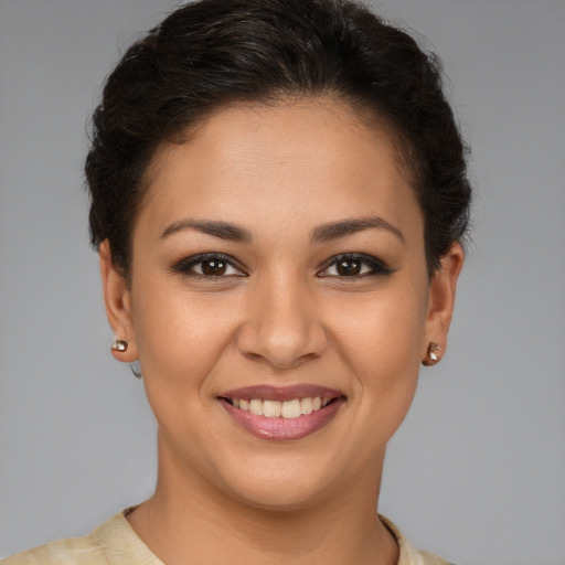 Joyful white young-adult female with short  brown hair and brown eyes