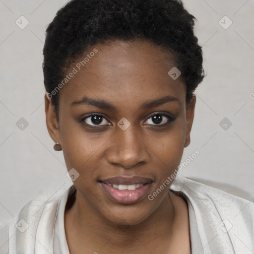 Joyful black young-adult female with short  black hair and brown eyes