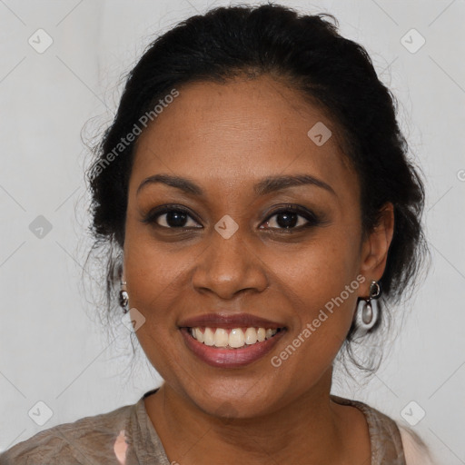 Joyful black young-adult female with long  brown hair and brown eyes