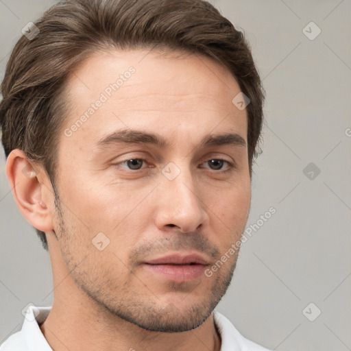 Neutral white young-adult male with short  brown hair and brown eyes