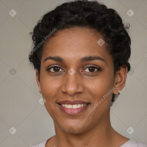 Joyful latino young-adult female with short  brown hair and brown eyes