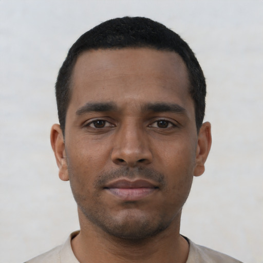 Neutral black young-adult male with short  black hair and brown eyes