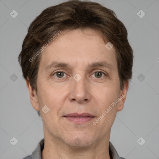 Joyful white adult male with short  brown hair and grey eyes