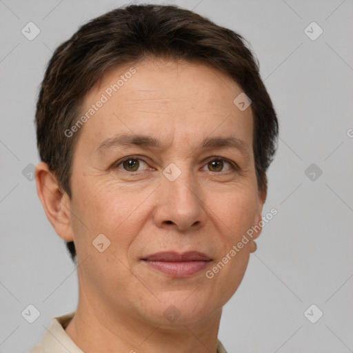 Joyful white adult female with short  brown hair and brown eyes