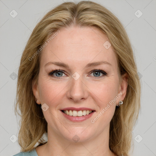 Joyful white young-adult female with medium  brown hair and blue eyes