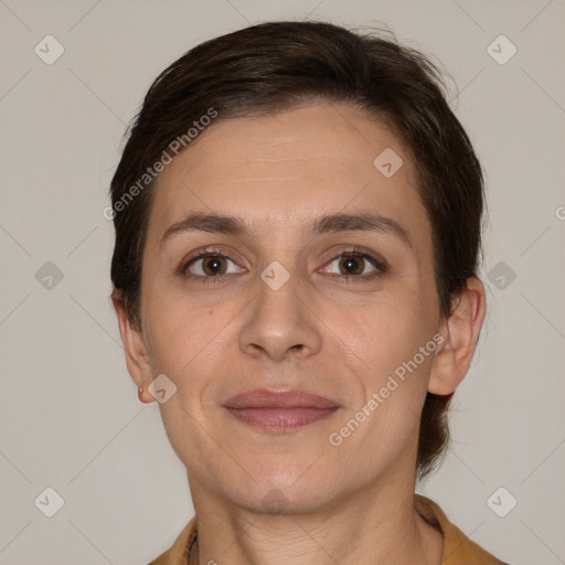 Joyful white adult female with short  brown hair and brown eyes