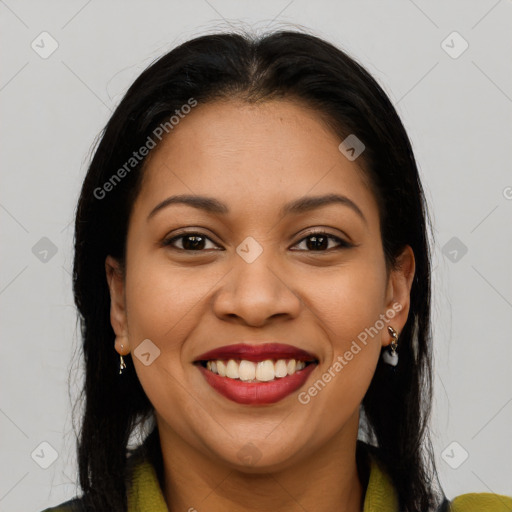 Joyful latino young-adult female with long  brown hair and brown eyes