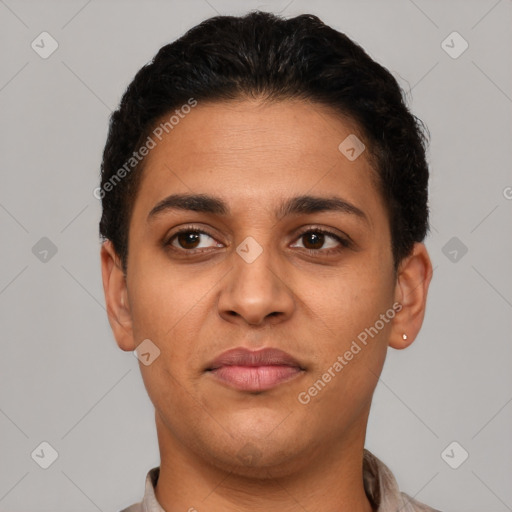 Joyful latino young-adult female with short  brown hair and brown eyes