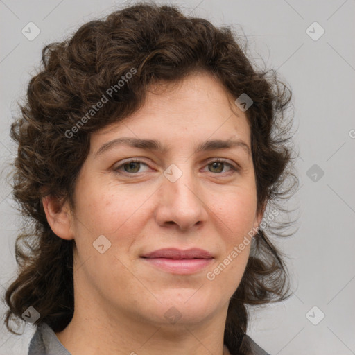 Joyful white young-adult female with medium  brown hair and green eyes