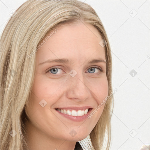 Joyful white young-adult female with long  brown hair and blue eyes