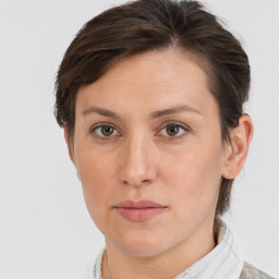 Neutral white adult female with short  brown hair and brown eyes