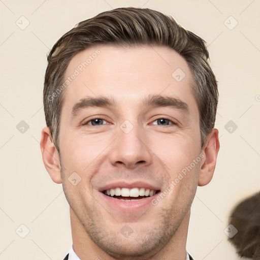 Joyful white young-adult male with short  brown hair and brown eyes