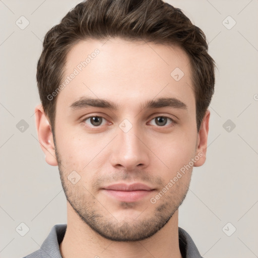 Neutral white young-adult male with short  brown hair and grey eyes