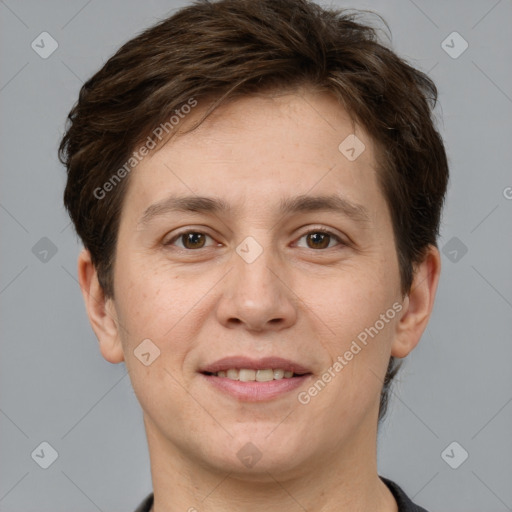 Joyful white adult male with short  brown hair and grey eyes