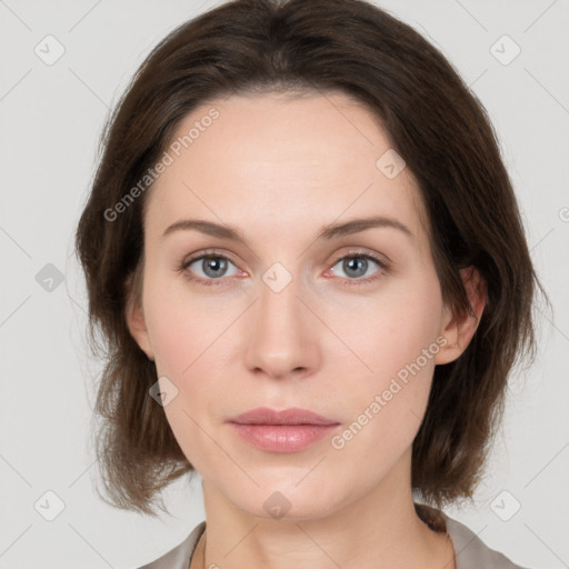 Neutral white young-adult female with medium  brown hair and grey eyes