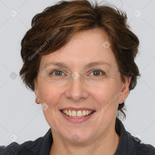 Joyful white adult female with medium  brown hair and blue eyes