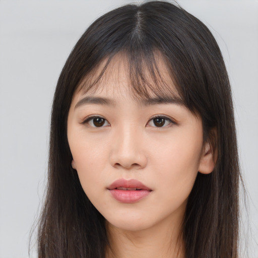 Neutral asian young-adult female with long  brown hair and brown eyes