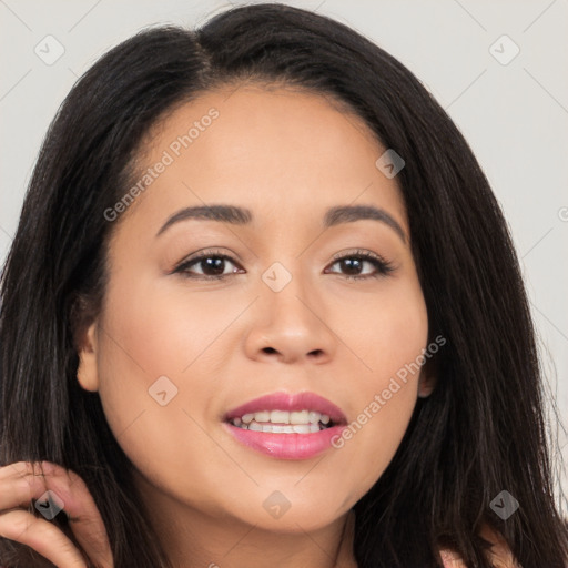 Joyful latino young-adult female with long  brown hair and brown eyes